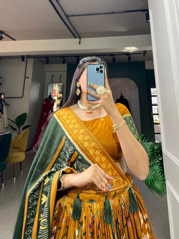 Mustard Tussar Silk Mustard Fabulously Patola Printed Stitched Lehenga & Blouse With Dupatta