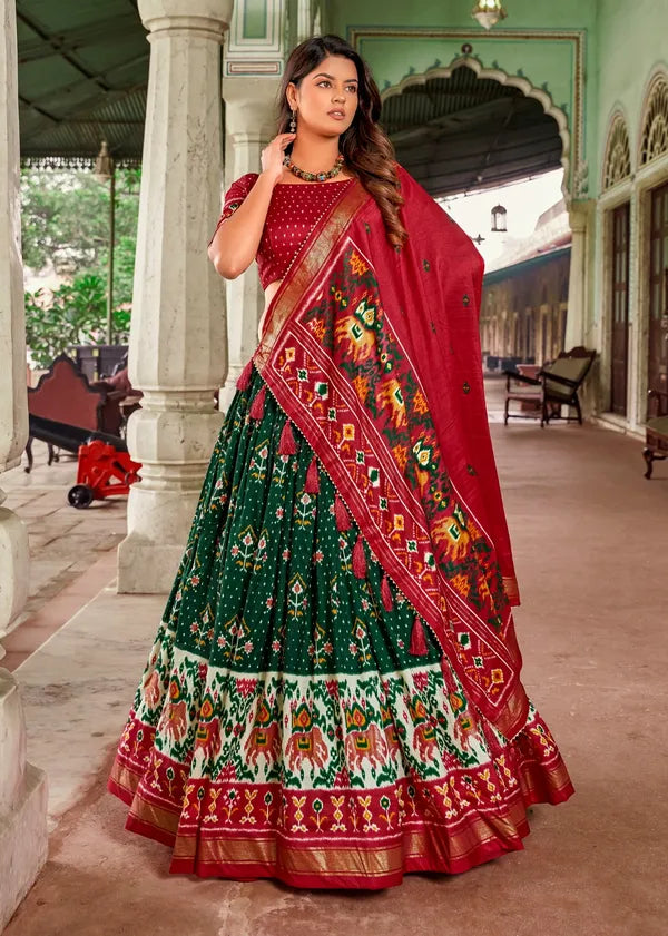 Green Tussar Silk Fabulously Patola Printed Stitched Lehenga & Blouse With Dupatta