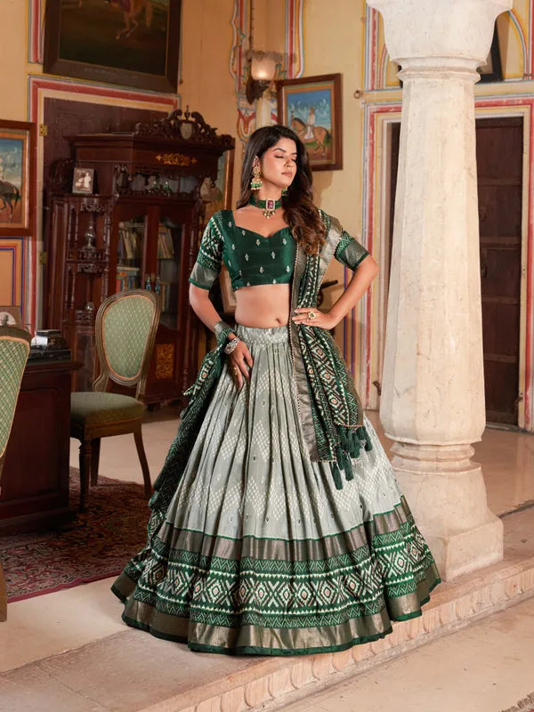 Green Color Silk Lehenga Choli With Patola Print Dupatta