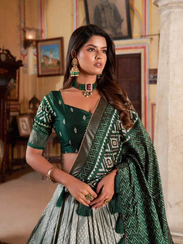 Green Color Silk Lehenga Choli With Patola Print Dupatta